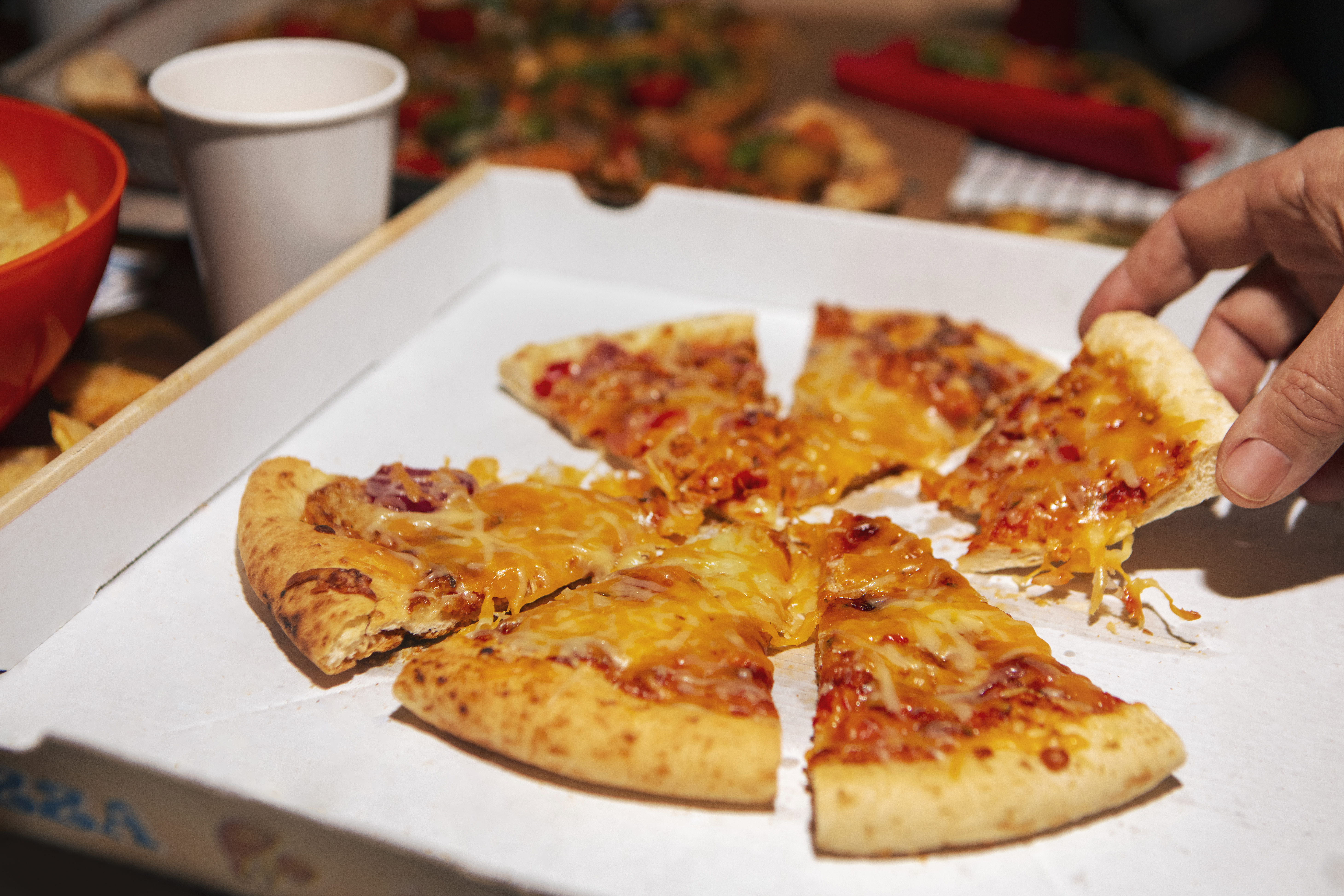 Costco food court nutrition — pizza hot dog and chicken bake calorie and macro breakdown