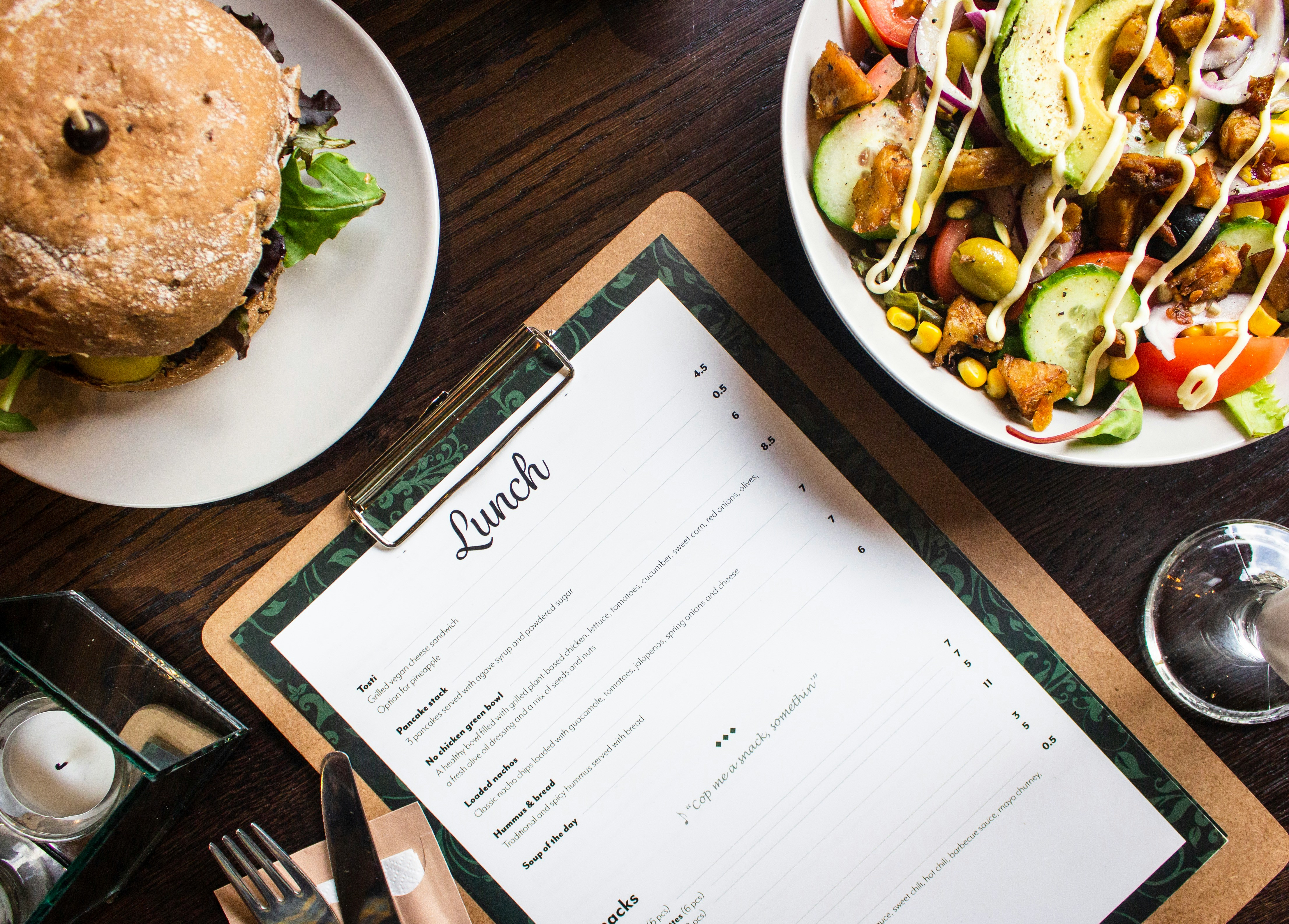 food journal — open notebook and healthy meal beside it for tracking eating habits